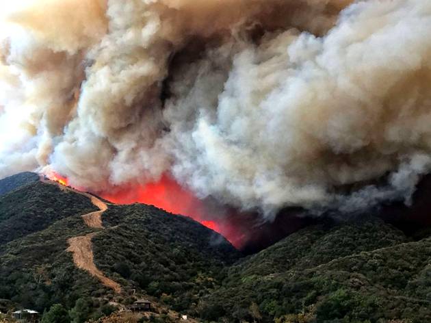 PHOTO: Flames churn towards a large fire break near homes along Gibraltar Road north of Santa Barbara, Calif., Dec. 16, 2017. 