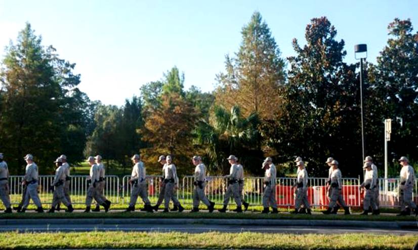 Florida state troopers head to the University of Florida campus in Gainesville, part of security preparations before a speech by white supremacist Richard Spencer on Thursday. (Chris McGonigal/HuffPost)