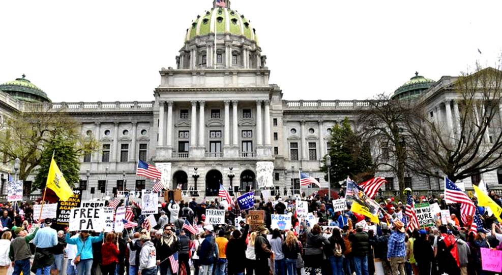 Protesters swarm Capitol as more restrictions take effect | KYW