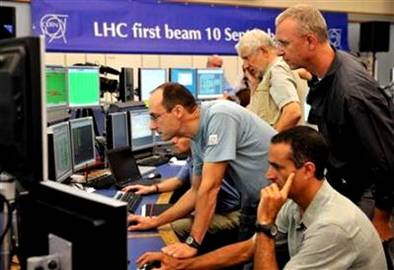 Scientists look at computer screens at the control centre of ...