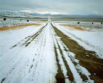 Stock Photo of  snow covered prairie road village eureka state nevada usa  
