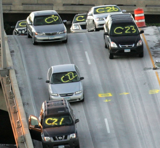 Cars that were traveling on the I-35W bridge when it collapsed have been marked by officials.
