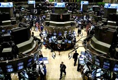 Traders work on the floor of the New York Stock Exchange August ...