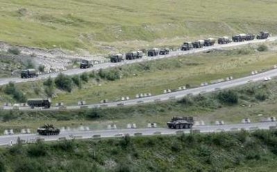 Russian military vehicles approach the Russian border as they ...