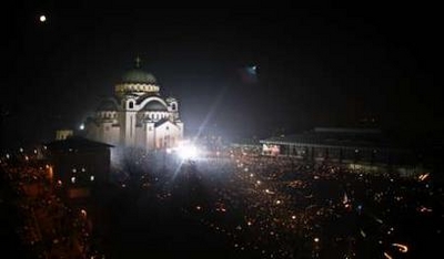 Thousands of Serbs burn candles and pray in front of Serbia&#39;s ...