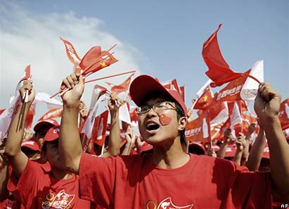 Демонстрация в ходе эстафеты олимпийского огня в Китае