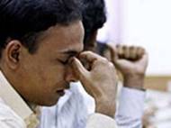 A stock broker reacts while trading at a brokerage firm in Mumbai January 21, 2008 (Reuters)