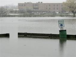 A parking lot along South Park Drive is flooded by the Cooper River Sunday, April 15, 2007, in Collingswood, NJ.
 Tom Mihalek -- AP Photo
