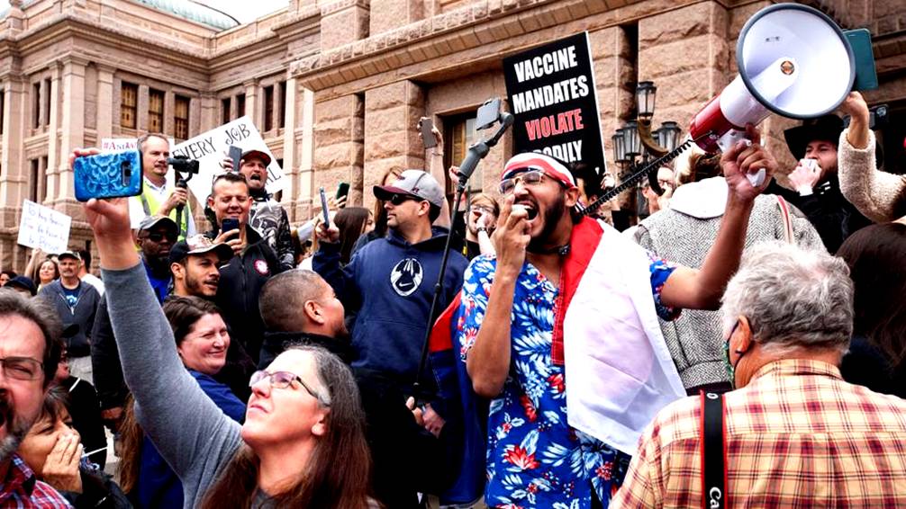 Protesters against the state's extended stay-at-home order to help slow the spread of coronavirus disease demonstrate at the Capitol building in Austin, Texas, US on April 18, 2020