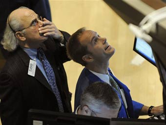 Трейдеры на Нью-Йоркской фондовой бирже. Фото AFP