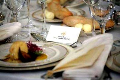 The place setting is seen for Libyan leader Moammar Gaddafi, ...