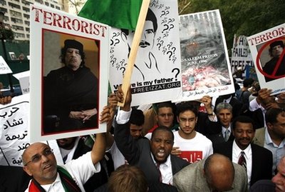 Demonstrators rally against Libyan leader Moammar Gadhafi across ...